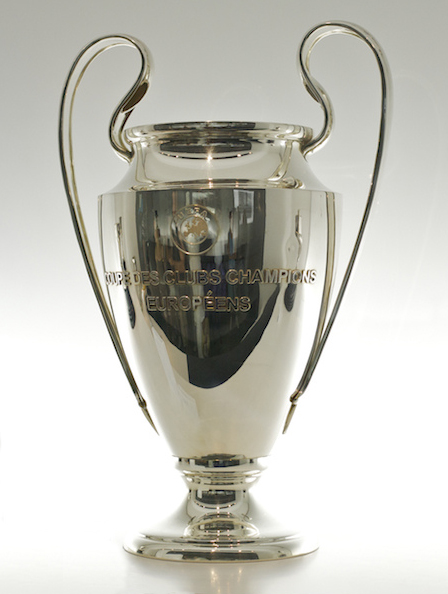 The UEFA Champions League trophy on display at an event